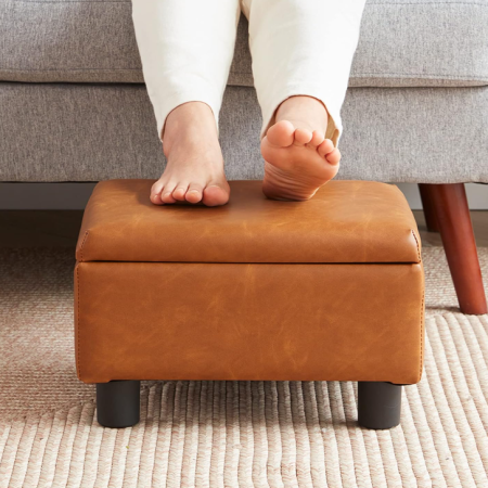 Minimal rectangular faux leather padded small foot stool, practical under-desk foot rest for living room, entryway and bedroom